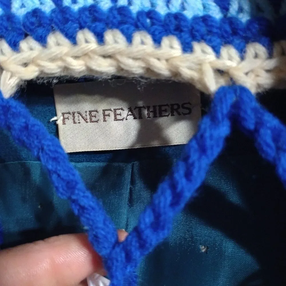 Fine Feathers size 8 women's 2-piece woolen suit. Gorgeous, one moth hole